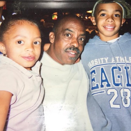 Chrissy Stokes with her brother and grandfather.